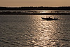 SmugMug > all-time keyword > taxi > Taxi boat on the Moose River moving through sun's reflection in front of sandbar on its way to Moose Factory.